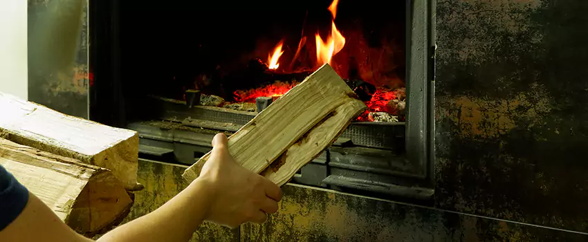 Wood Stove Heat Resistant Wall Repair in DAlembert, Quebec